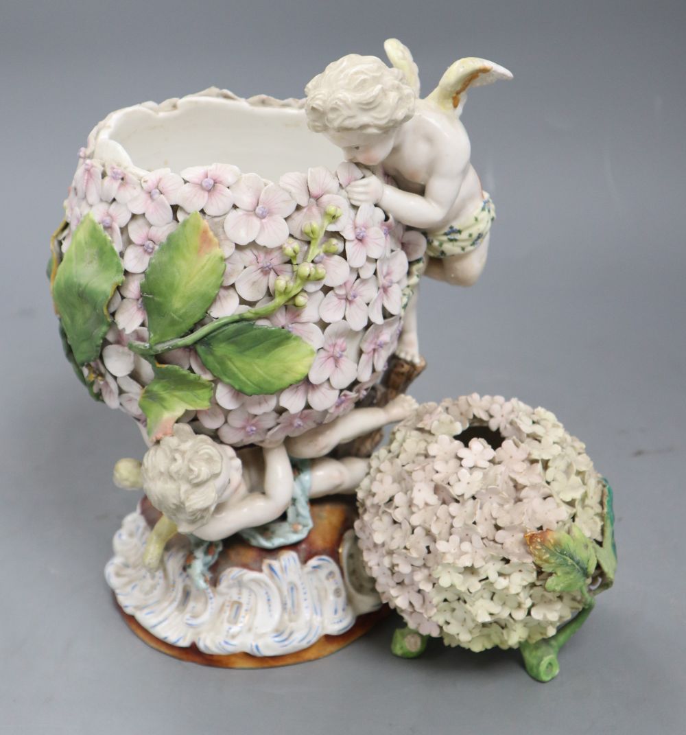 A German centrepiece, height 22cm and a small vase